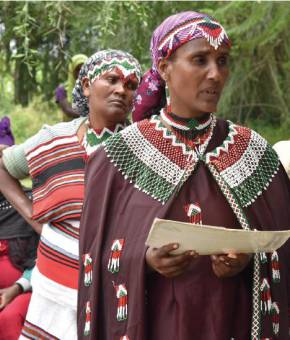 Fatouma Burka with the ‘Model Cooperative’ Certificate of Recognition awarded to the cooperative by the Oromia Regional State of Ethiopia