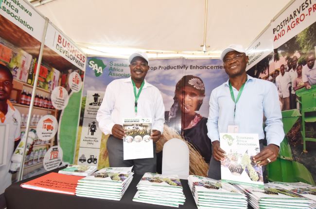 Dr. Bidjokazo Fofana and Mr. Ande Okiror received visitors at the booth and addressed SAA’s mission, vision and core values