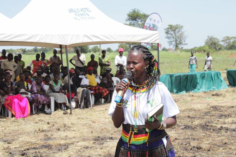 The Chairperson of the Apeitolime Farmers Association, Ms. Moddo Natalina, making a speech at the groundbreaking ceremony.