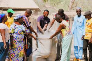 Members of Apashi Woza MPCs packaging Biochar after production