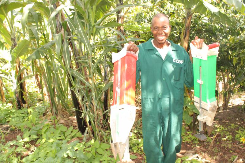 Joseph proudly showcases his seed planters, tools that have transformed his farming journey and empowered him to deliver precision planting services across borders.