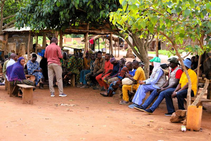 SAA Program Officer Dr. Moshood Sulaiman with Abokede community members during the 2026 ToT visit in Oyo State.