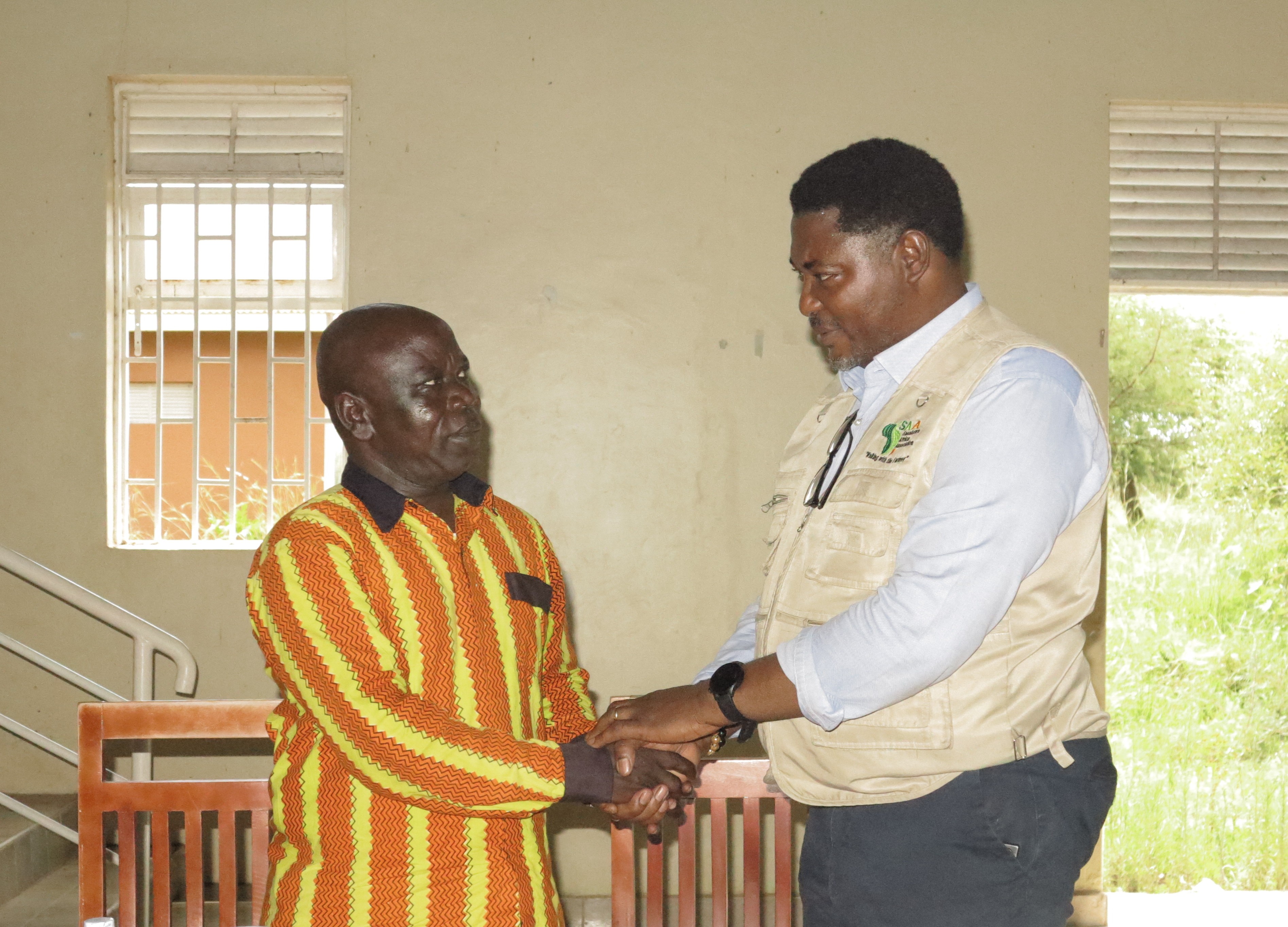 DRDC Mr. Swadik Angupale and SAA Uganda Country Director 