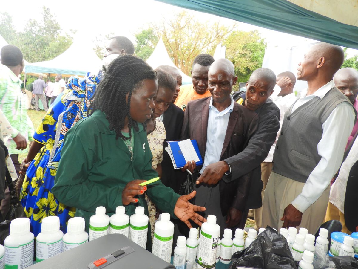 Farmers inquire about different products at Thierty's stall.