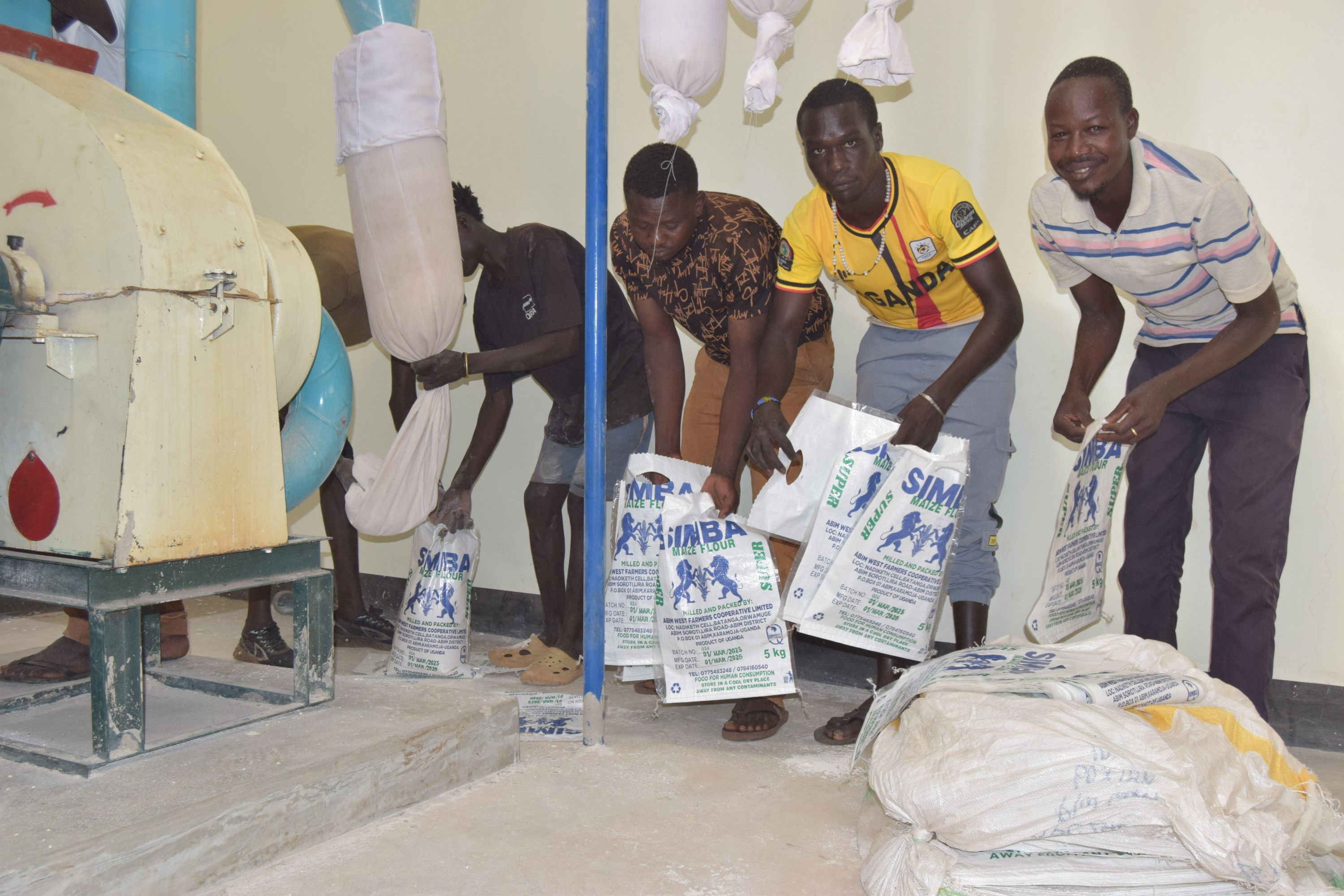 Youth packing milled produce at the OSCA