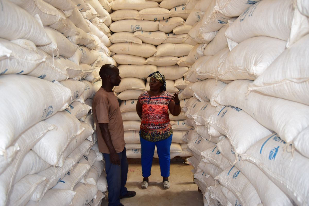 SAA officer and OSCA staff inspect the storage conditions of bulk stores at the OSCA.