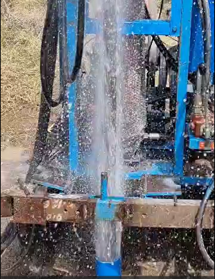 A splash of water from a newly drilled borehole in Karamoja