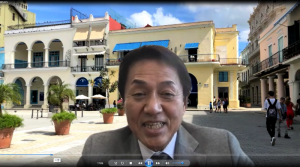 北中と一緒に訪れたというカフェ(キューバの首都ハバナ)を背景に語る川島氏